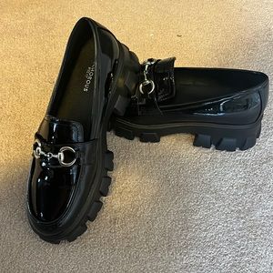 Brand new lug soled loafers with silver embellishment. Size 9.